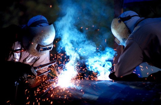 Welders with experience of work in shipyards